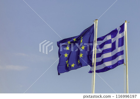 Greece, Nikiti, Greek and European flag in the wind 116996197