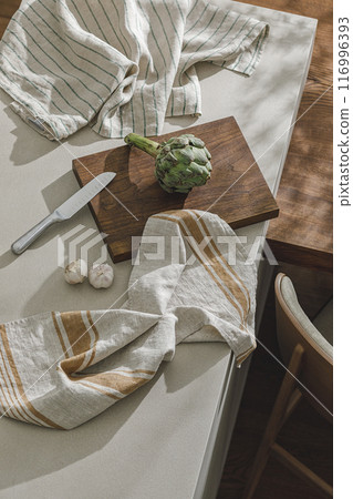 Assortment of fresh vegetables, linen towels and stainless still kitchen appliances. Healthy food cooking ingredients background with fresh vegetables Assortment of fresh vegetables, linen towels and stainless still kitchen appliances. Healthy food cooking ingredients background with fresh vegetables 116996393