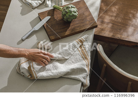 Assortment of fresh vegetables, linen towels and stainless still kitchen appliances. Healthy food cooking ingredients background with fresh vegetables Assortment of fresh vegetables, linen towels and stainless still kitchen appliances. Healthy food cooking ingredients background with fresh vegetables 116996396