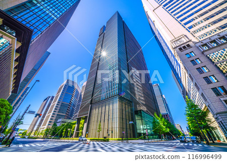 Tokyo cityscape in Japan: Patterns appear on the road! ... A mysterious scene created by sunlight reflecting off Otemachi Tower = May 5th 116996499