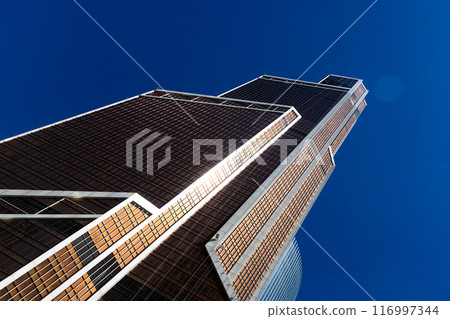 Moscows Towering Steel and Glass Against a Vibrant Blue Sky Moscows Towering Steel and Glass Against a Vibrant Blue Sky 116997344