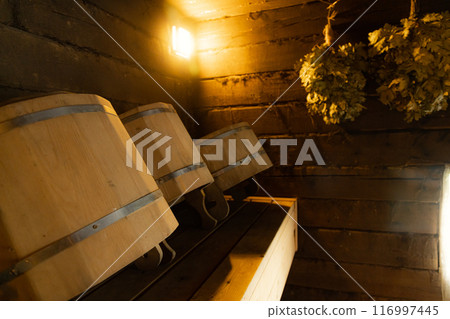 Wooden Buckets in a Rustic Russian Bathhouse Wooden Buckets in a Rustic Russian Bathhouse 116997445
