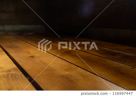 Wooden Bench in a Traditional Russian Bathhouse 116997447