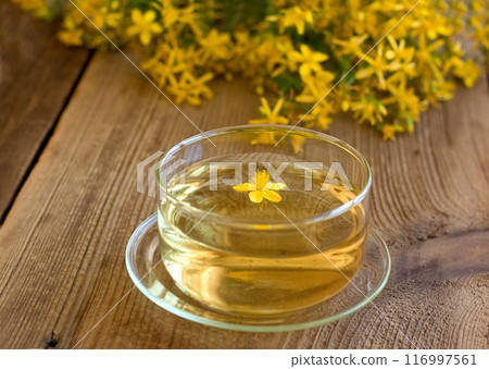 Herbal tea from Hypericum perforatum commonly known as St John's wort. Herbal tea from Hypericum perforatum commonly known as St John's wort. 116997561