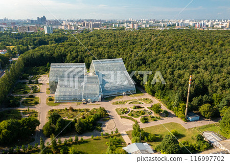Enigmatic Greenhouse Oasis Amongst Lush Moscow Arboretum Enigmatic Greenhouse Oasis Amongst Lush Moscow Arboretum 116997702