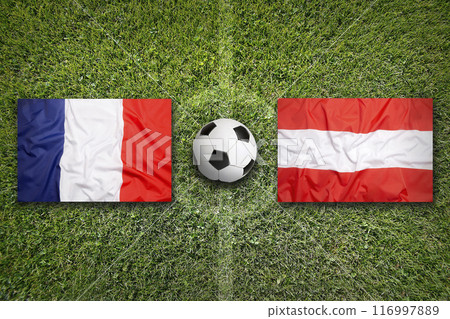 France vs. Austria flags on soccer field 116997889