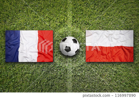 France vs. Poland flags on soccer field France vs. Poland flags on soccer field 116997890