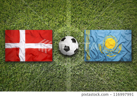 Denmark vs. Kazakhstan flags on soccer field 116997991