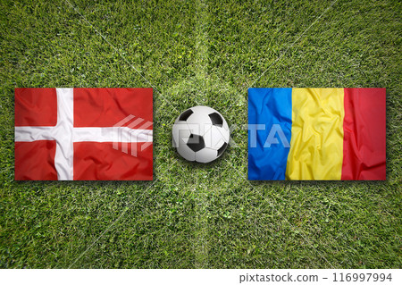 Denmark vs. Romania flags on soccer field 116997994