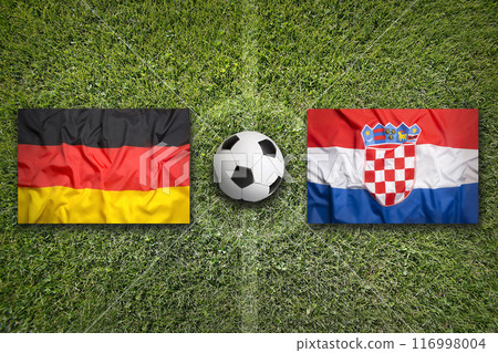 Germany vs. Croatia flags on soccer field 116998004