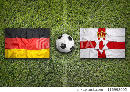 Germany vs. Northern Ireland flags on soccer field 116998005