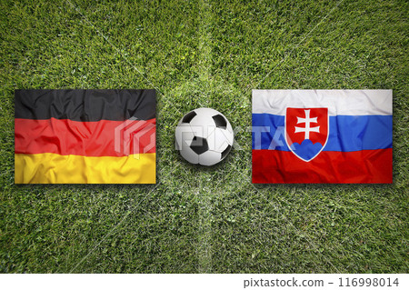 Germany vs. Slovakia flags on soccer field 116998014