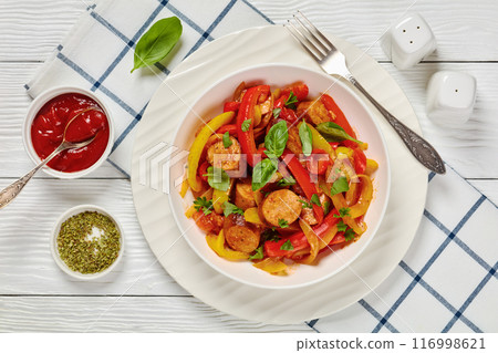 zesty italian sausage peppers and onions, top view 116998621