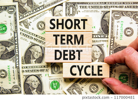 Short term debt cycle symbol. Concept words Short term debt cycle on beautiful wooden block. Beautiful dollar bills background. Dollar bills. Business Short term debt cycle concept. Copy space. Short term debt cycle symbol. Concept words Short term debt cycle on beautiful wooden block. Beautiful dollar bills background. Dollar bills. Business Short term debt cycle concept. Copy space. 117000481