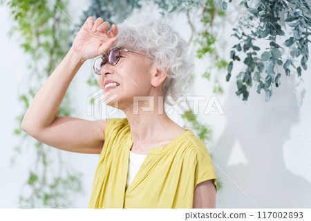 Senior woman suffering from heat stroke in summer Senior woman suffering from heat stroke in summer 117002893