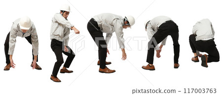 Full-body cutout of a man working in a factory or construction job wearing a helmet manufacturing uniform Full-body cutout of a man working in a factory or construction job wearing a helmet manufacturing uniform 117003763