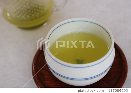 Hot Shizuoka green tea being poured at breaktime 117004903