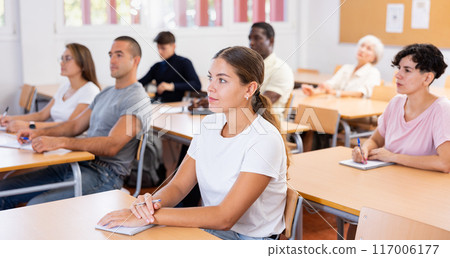Attentive university students in advanced training courses in auditorium 117006177