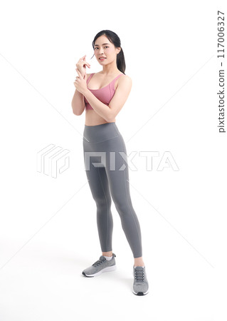 Beautiful young asian sport woman with sportswear ready for exercise on white background, Advertising sportswear and yoga wear, Healthy lifestyle, sport. 117006327