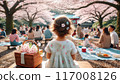 Back view of a girl enjoying cherry blossom viewing 117008126