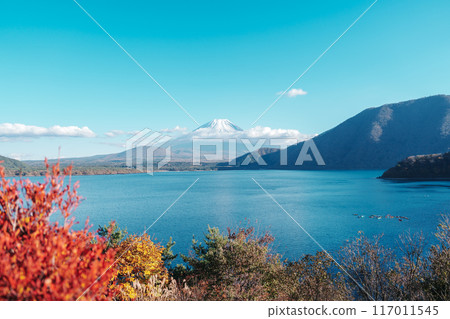 Mount Fuji at Lake Motosu in Autumn season. Mt Fujisan in Fujikawaguchiko, Yamanashi, Japan. Landmark for tourists attraction. Japan Travel, Destination, Vacation and Mount Fuji Day concept 117011545