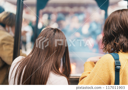 Tourists visit Sensoji Temple or Asakusa Kannon Temple is a Buddhist temple located in Asakusa. Landmark and popular for tourist attraction and Travel destination in Tokyo, Japan and Asia concept Tourists visit Sensoji Temple or Asakusa Kannon Temple is a Buddhist temple located in Asakusa. Landmark and popular for tourist attraction and Travel destination in Tokyo, Japan and Asia concept 117011903