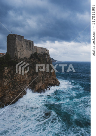 Dubrovnik walls and rough sea Dubrovnik walls and rough sea 117011995