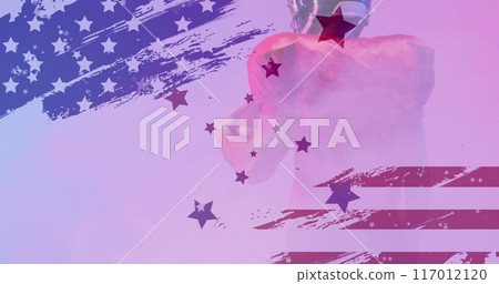 Image of caucasian american football player and flag of usa 117012120