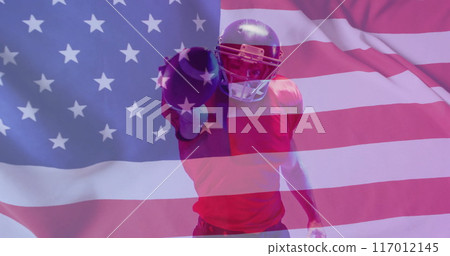 Image of caucasian american football player and flag of usa 117012145