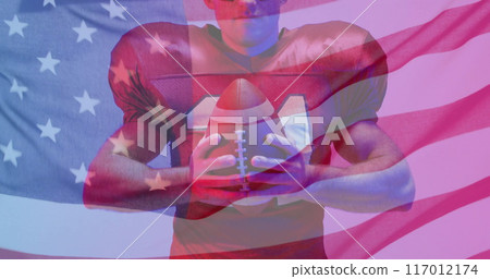 Image of caucasian american football player and flag of usa Image of caucasian american football player and flag of usa 117012174