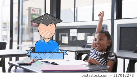 Raising hand, smiling child in classroom with graduation image over desk Raising hand, smiling child in classroom with graduation image over desk 117012278