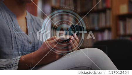 Image of ai text and data over biracial female student in hijab with smartphone 117012494