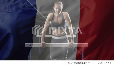 Image of flag of france over caucasian female runner 117012635
