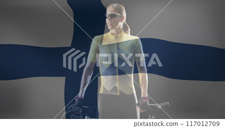 Image of flag of finland over caucasian female cyclist 117012709