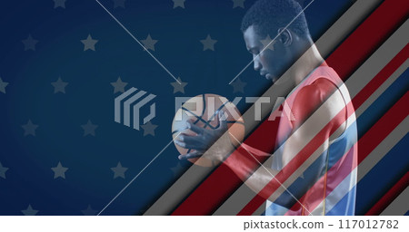 Image of flag of usa over biracial male basketball player 117012782