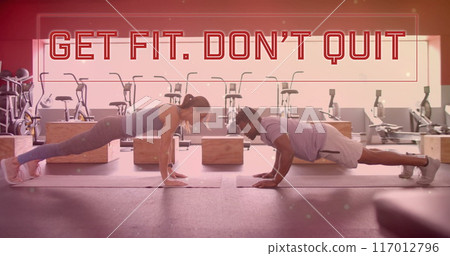 Image of get fit don't quit text over diverse man and woman exercising in gym Image of get fit don't quit text over diverse man and woman exercising in gym 117012796