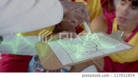 Image of digital data processing over diverse basketball players with coach Image of digital data processing over diverse basketball players with coach 117012854