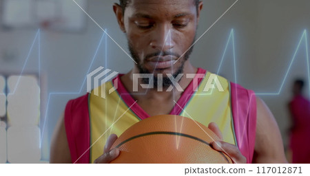 Image of digital data processing over african american basketball player on court 117012871