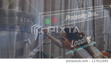 Processing data and loading image over woman working in industrial facility 117012895