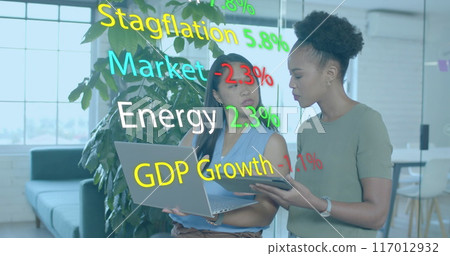 Image of financial data processing over diverse african american businesswomen in office 117012932