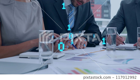 Image of binary coding data processing over diverse business people in office 117012992