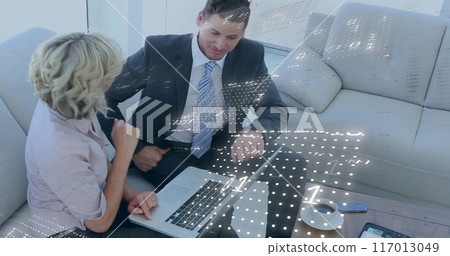 Image of binary coding data processing over diverse business people in office Image of binary coding data processing over diverse business people in office 117013049