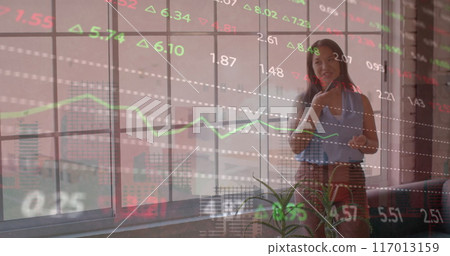 Image of financial data processing over biracial businesswoman in office 117013159