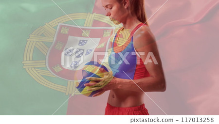 Image of flag of portugal over caucasian female volleyball player Image of flag of portugal over caucasian female volleyball player 117013258