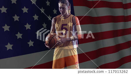 Image of flag of usa over caucasian female basketball player 117013262