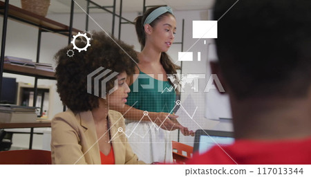 Image of media and data icons over diverse female colleagues at casual office meeting 117013344