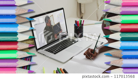 Image of pencils over african american schoolgirl having laptop image call with teacher 117013568