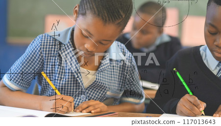 Image of math formulas over african american pupils learning at school Image of math formulas over african american pupils learning at school 117013643