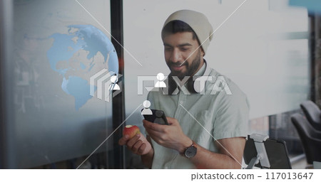 Image of digital icons, globe and data processing over biracial businessman in office 117013647