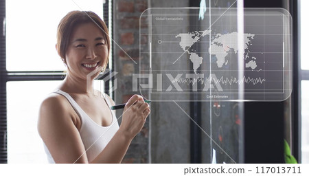 Image of world map and data processing over asian businesswoman in office Image of world map and data processing over asian businesswoman in office 117013711